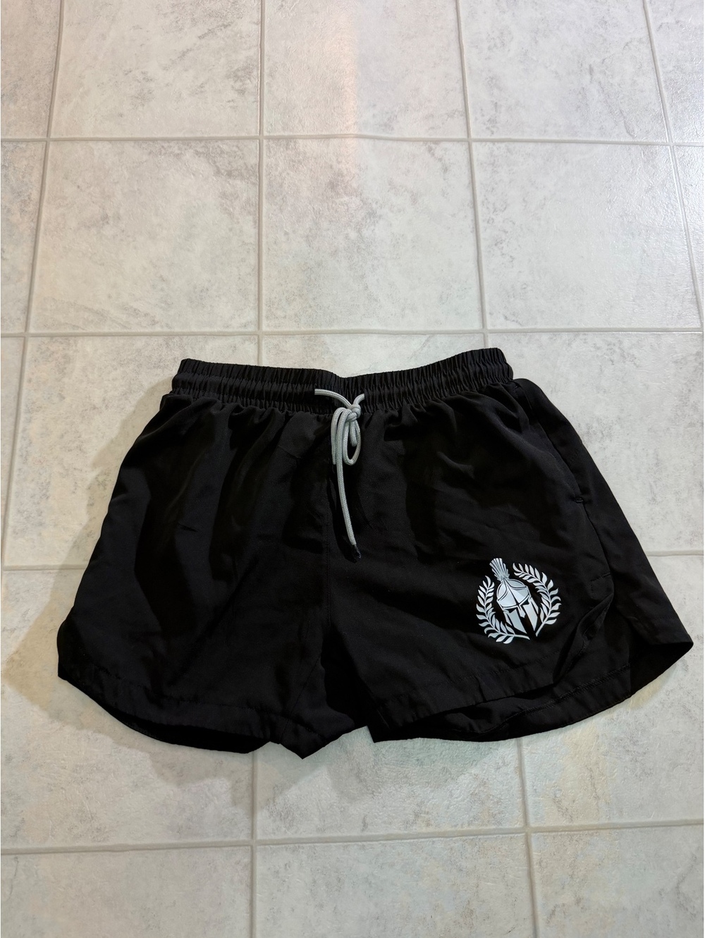 Black Athletic Shorts with Drawstring Waist and White Logo